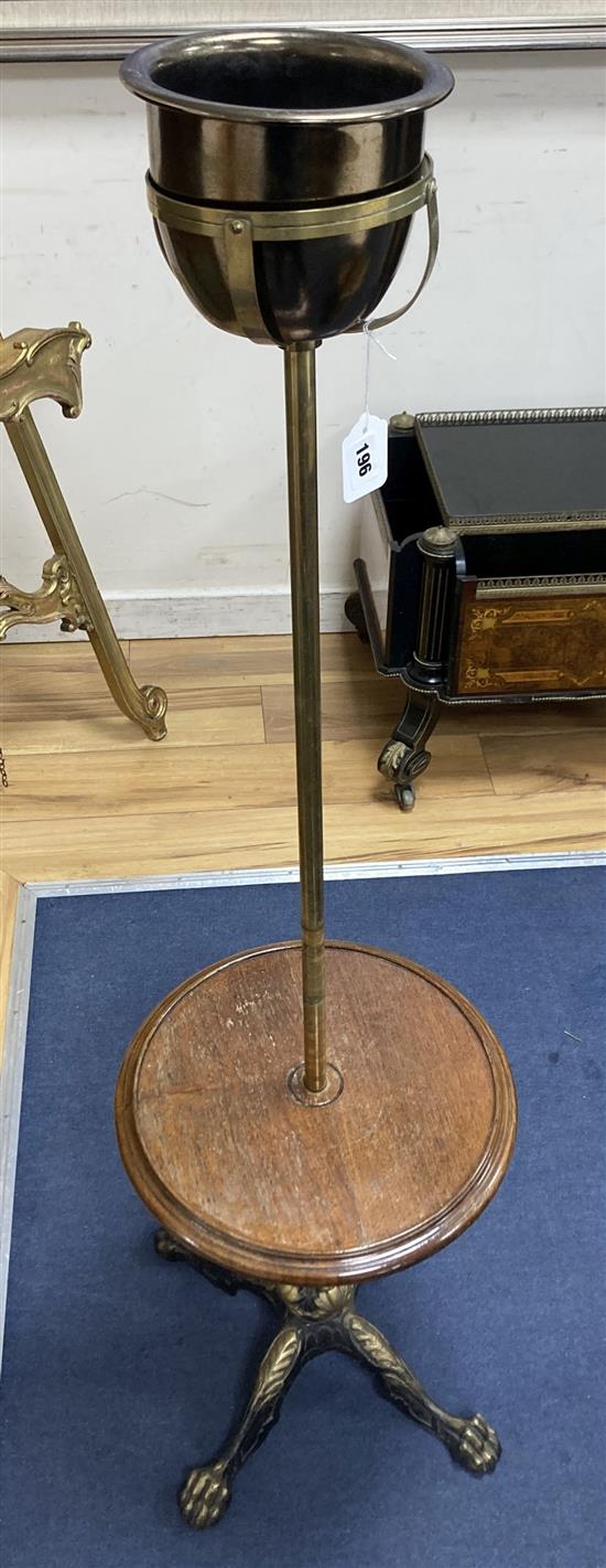 A Victorian adjustable iron and brass lamp, height 133cm